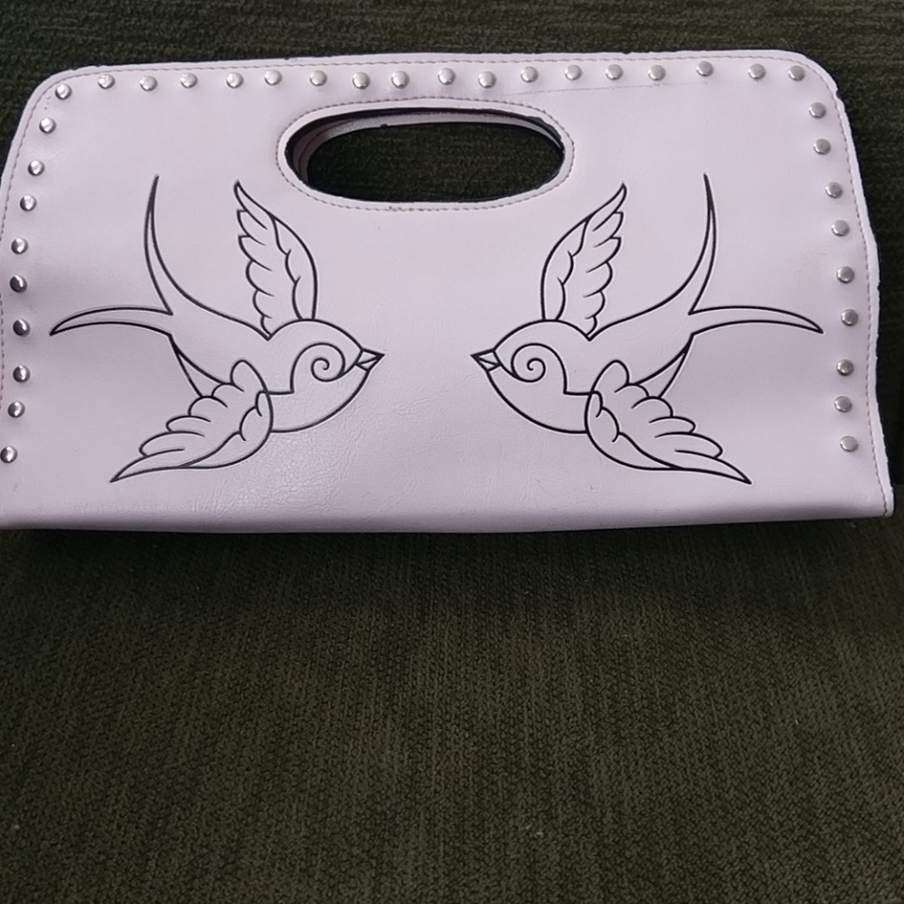 Gently used pink Lux de Ville zipper clutch